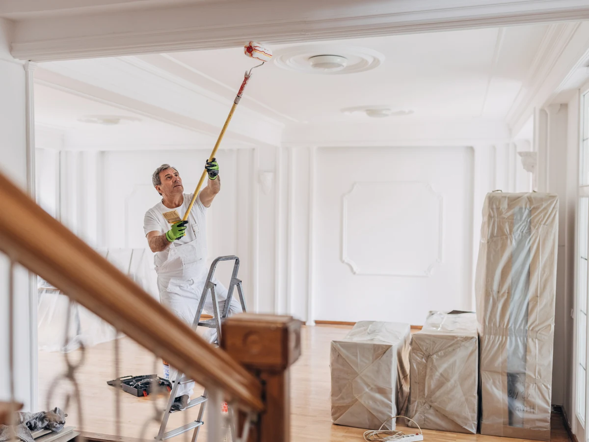 ceiling-painting-man-white-ceiling-bradford-decorators Clear Pricing in Bradford by Bradford Decorators