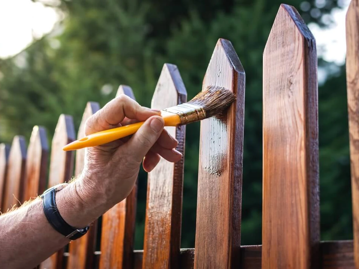 fence-painting-hand-wooden-picket-bradford-decorators Close-Board Fencing in Bradford by Bradford Decorators